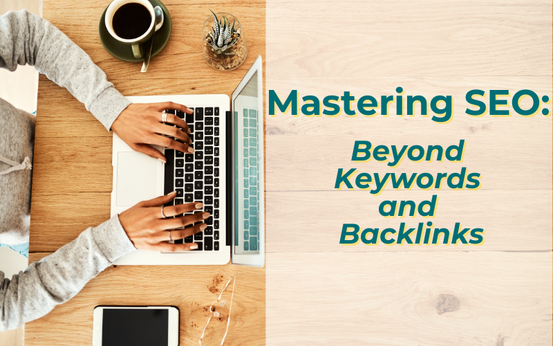 Top-down view of a person typing on a laptop, coffee cup, and small plant on a wooden desk, symbolizing advanced seo services that go beyond basic keyword strategies. This image relates to an experienced seo services company specializing in cannabis copywriting.